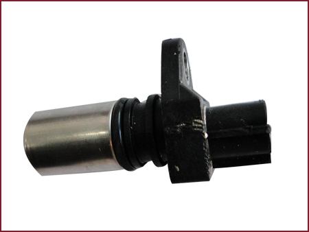 Electrically mounted camshaft position sensor